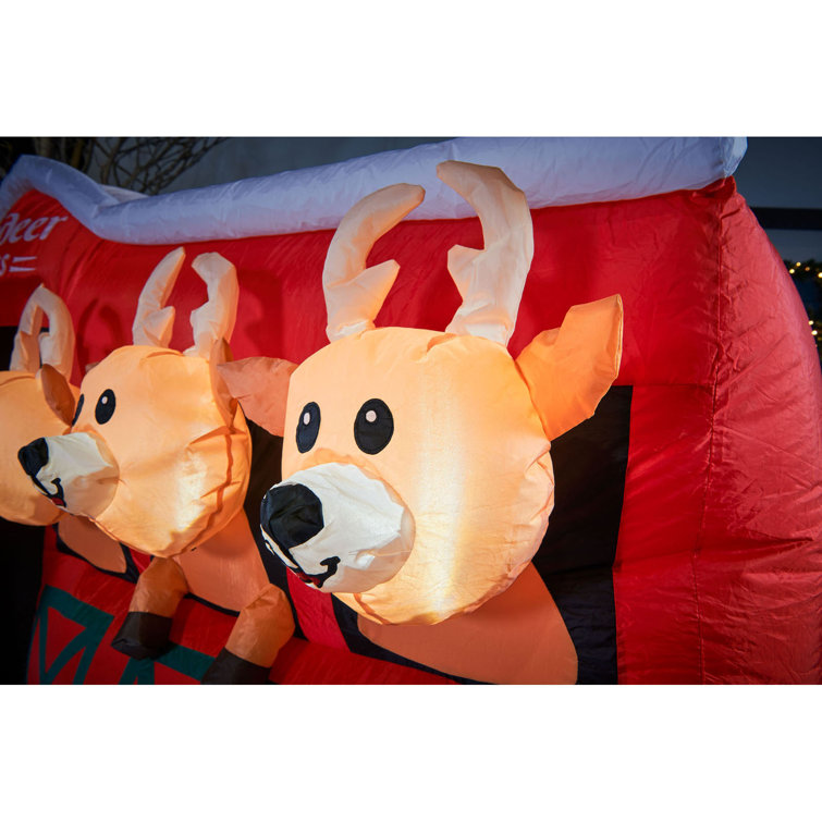 The Seasonal Aisle Santa and Reindeer Stables Inflatable Wayfair.co.uk